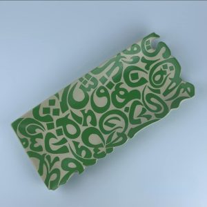 A rectangular platter adorned with calligraphy cut edges