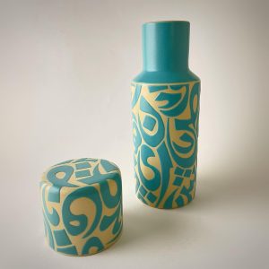 A personal carafe with a cup lid for effortless bedside or table use.