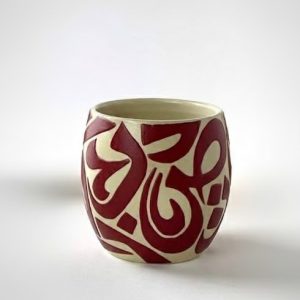 A U-shaped tumbler with a curved
