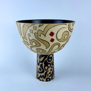 A pedestal bowl on a sturdy cylindrical stem