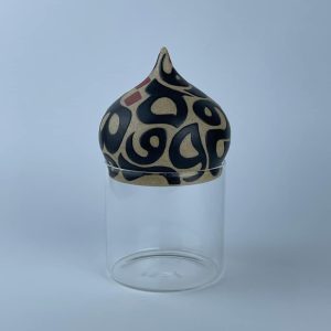 A ceramic dome featuring calligraphy motif