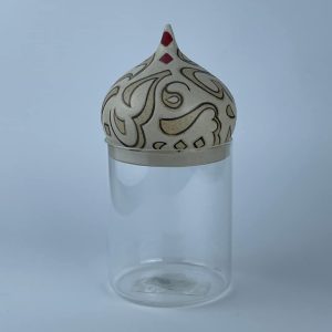 A ceramic dome featuring calligraphy motif