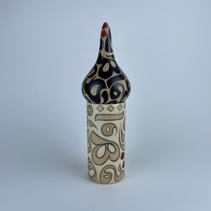 A minaret-inspired piece with contrasting calligraphy motifs