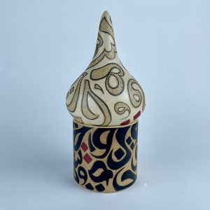 A minaret-inspired piece with contrasting calligraphy motifs