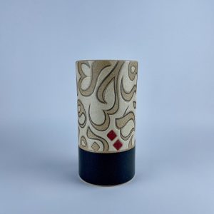 cylindrical vase featuring black calligraphy motifs