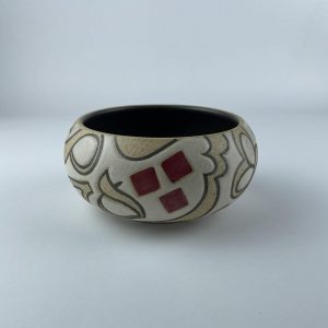 A curved-rim snack bowl featuring calligraphy motifs