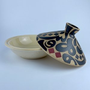 Tajine with a conical lid featuring black calligraphy and a solid beige base