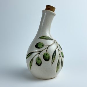 A multi-use bottle featuring olive branch motifs. Suitable for serving oil
