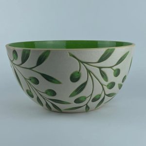 A U-shaped bowl with delicate olive branch and leaf motifs on a white background