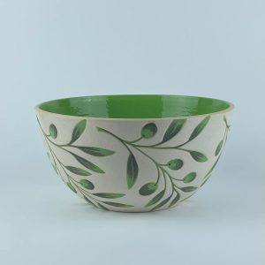 A U-shaped bowl with delicate olive branch and leaf motifs on a white background