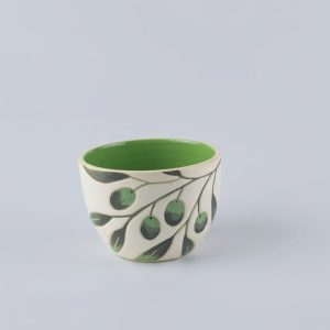 A U-shaped snack bowl featuring delicate olive branch and leaf motifs on a soft white surface