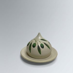 A mini cloche plate for treats. The lid features delicate olive branch and leaf motifs on a soft white surface