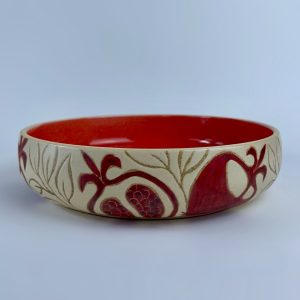 A bowl with a curved rim