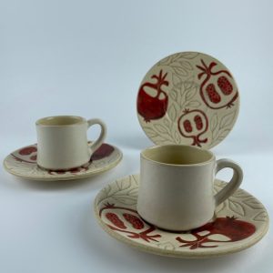 A set of six Turkish coffee cups finished in solid beige glaze